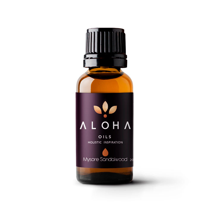 A 20ml amber glass bottle of Aloha Oils Mysore Sandalwood essential oil with a sleek black cap and a modern purple label featuring the Aloha Oils logo and the tagline 'Holistic Inspiration.'